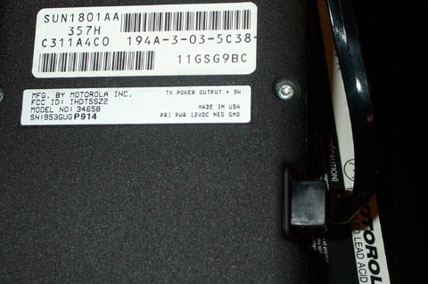 1995 Ford Crown Victoria - Label details for a Motorola device, including FCC ID and serial number.