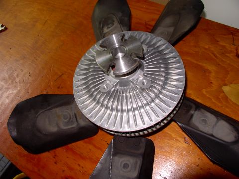 1986 Ford Bronco - Stop at this point and verify you havve the correct fan clutch. Here the new one is on top of the old one to see if they match up. What's t…