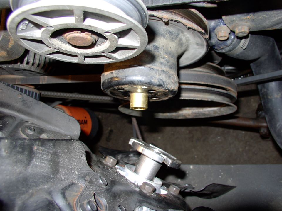 I found it much easier to put the bushing onto the water pump shaft first