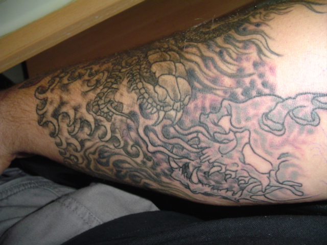 Dragon tattoo on a person's arm