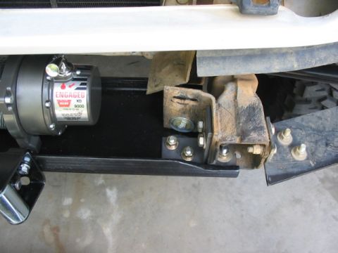1995 Ford Bronco - Close-up of a vehicle's winch mount, a Warn KD 9000 winch.