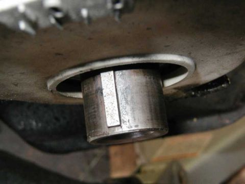 1993 Ford Taurus - A close-up view of a metal shaft with a keyway, likely a component of a vehicle's drivetrain or engine.