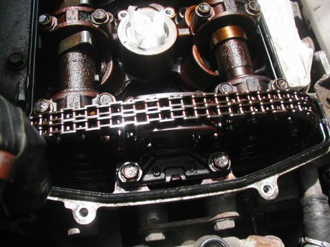 1993 Ford Taurus - Engine internal components, including a timing chain and camshaft, are visible in this close-up view.
