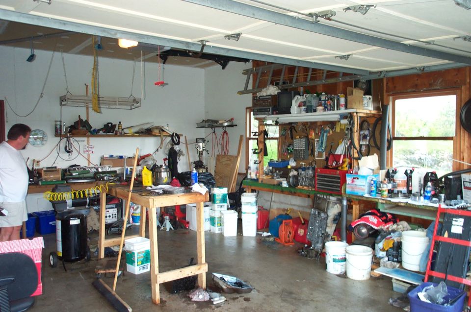 The old man in disbelief of his once clean garage.