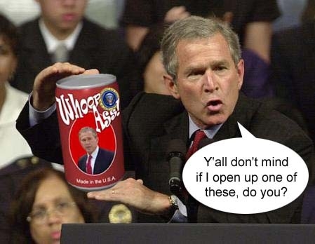 1993 Ford Bronco - George W. Bush holds a can of 'Whoop Ass' during a public appearance.