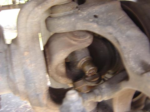 1993 Ford Bronco - A detailed view of a vehicle's suspension system, showing mechanical components.