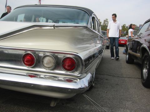 1992 Ford Crown Victoria - Rear view of a classic Chevrolet sedan, likely a 1959 or 1960 model, parked outdoors.