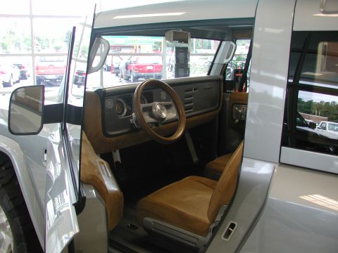 1985 Ford Bronco - Interior of a concept SUV with tan upholstery and a distinctive dashboard design.