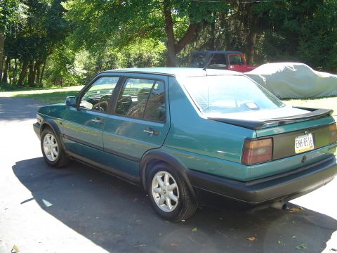 1992 Volkswagen Jetta - This 1992 Volkswagen Jetta is seen from the rear 3/4 angle, its green exterior.