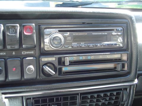 1992 Volkswagen Jetta - Close-up of a car's dashboard showing the radio and various switches.
