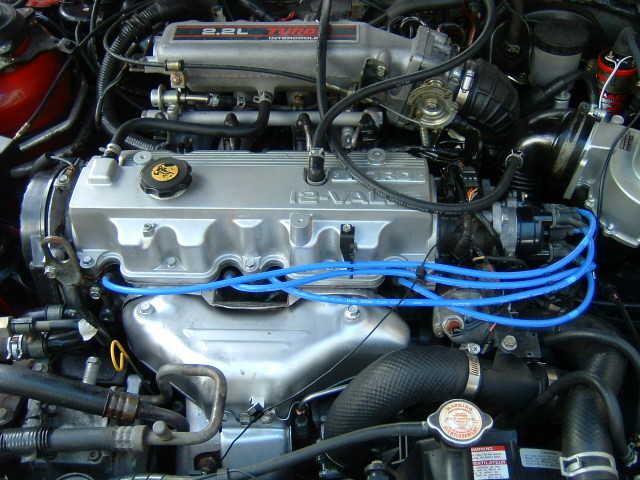 2.2L Turbo Intercooled 12-valve engine with blue spark plug wires and silver valve cover