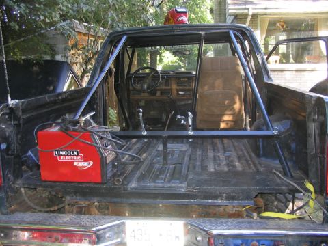 1986 Ford Bronco - This modified Ford Bronco features a custom roll cage and a Lincoln Electric welder in its bed.