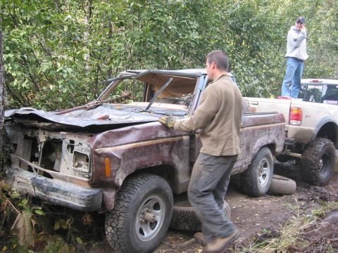 1985 Ford Bronco - New tires installed and roof yanked up high enough so that all could drive the thing.