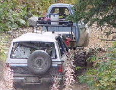 1985 Ford Bronco - The big silver Dildo(Sorry dan but it does look like one) pulling on the 2nd BII. This one had brakes.