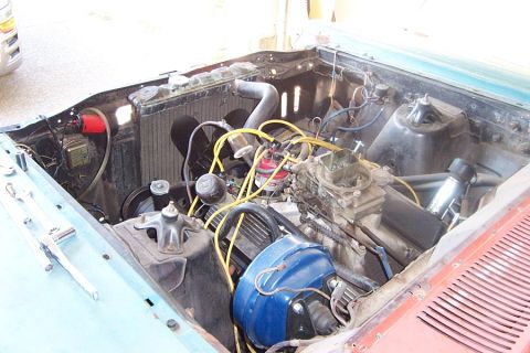 1966 Ford Fairlane - Engine compartment of a 1966 Ford Fairlane, showing the V8 engine and associated components.