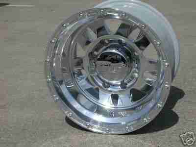 2003 Ford Excursion - a new set of 16X10 AMERICAN EAGLE POLISHED WHEELS are here cost $680, just need to put rubber on them. hmmm 35? 37? 60? well maybe not 60!