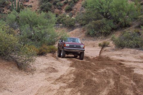 1992 Ford Bronco - This 1992 Ford Bronco navigates a dusty desert trail.