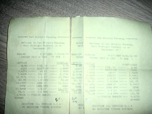 Two drag strip timing slips from San Antonio Raceway, dated 9/17/2004