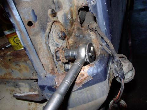 1986 Ford Bronco - In spite of having the tail lights out for removal of the tailgate hinges, and being able to heat the fixed nuts........