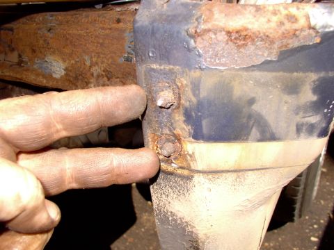 1986 Ford Bronco - I done busted off another three of those 10mm bolts that hold on the spare tire carrier.