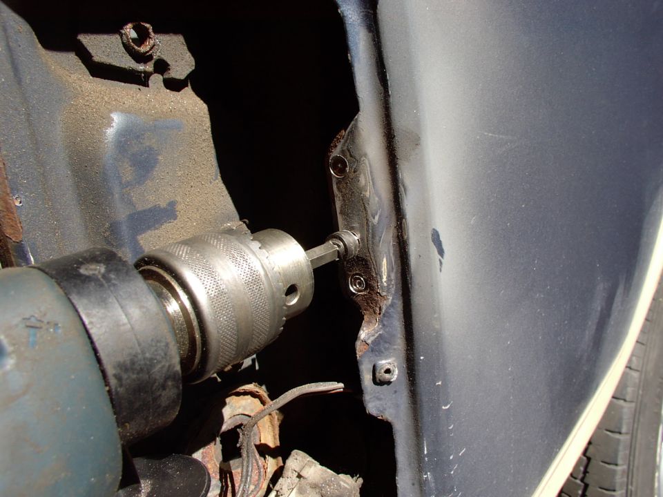 Spot weld cutter going to work on those same spot welds.