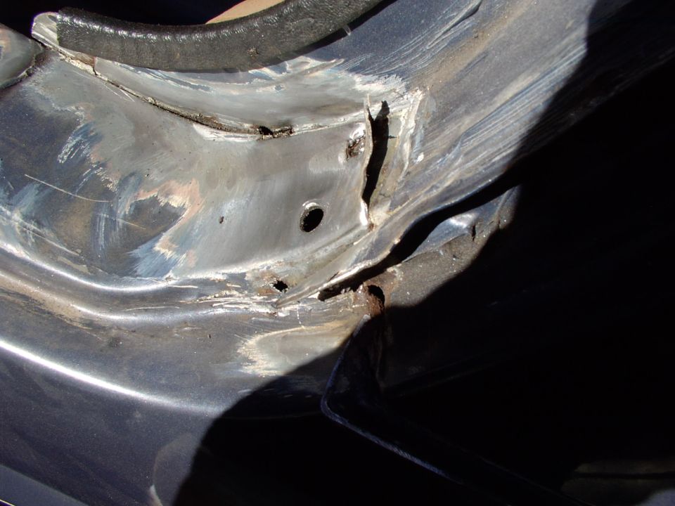 Again peel back the quarter panel loose from the support framing.