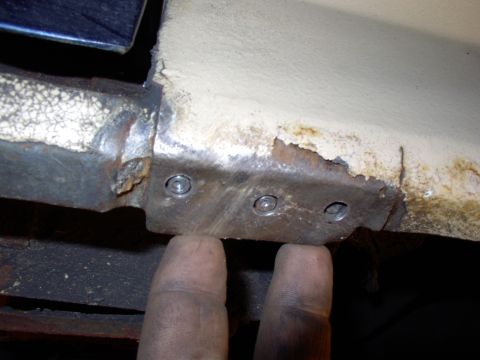 1986 Ford Bronco - Yes, this is the other side but the photo was better. This area is the only lower attaching point ahead of the wheelwell itself. Drill out…