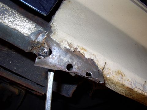 1986 Ford Bronco - Lever and pry the metal loose to seperate it.