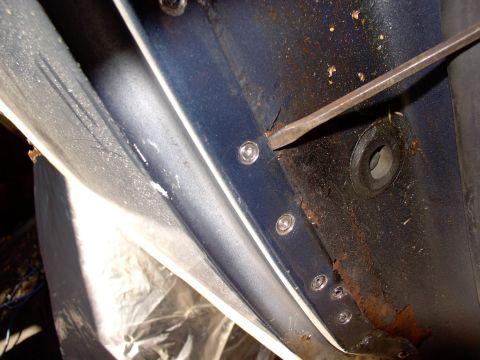 1986 Ford Bronco - After the door jam spotwelds are all identified and drilled out just lever the welds loose and pop that part of the quarter loose. Both sid…