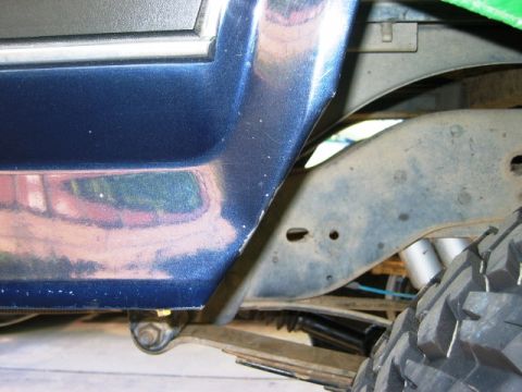 1985 Ford Bronco - Bent back the fender to clear the 37's