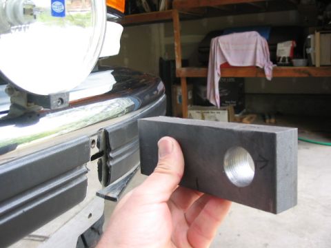 1995 Ford Bronco - once the 1" hole is cut, it needs to be carefully measured for the (2) 1/2" mounting holes. (the 1/2" bolts are already there as the top bo…