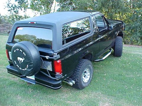1995 Ford Bronco - This black Ford Bronco appears to be from the early to mid-1990s, not a 1995 model.