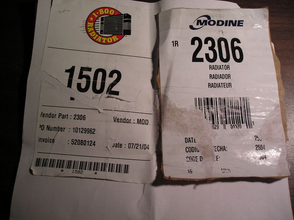 Two stacked radiator parts labels, one Modine reading 2306, one 1-800-Radiator reading 1502