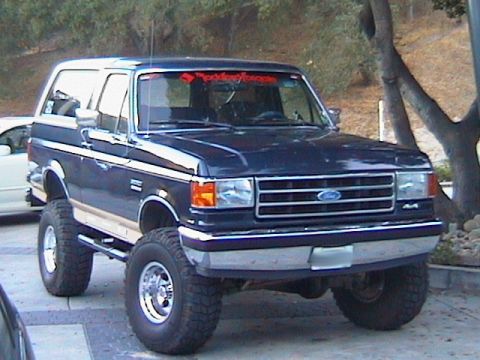 1991 Ford Bronco - This lifted 1991 Ford Bronco has a prominent Rockford Fosgate banner across the top of the windshield.