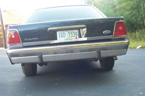1991 Ford LTD Crown Victoria - Rear view of a 1991 Ford Crown Victoria LTD, showing the taillights and license plate.