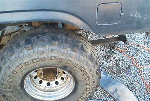1986 Ford Bronco - Close-up of the rear wheel and fender flare on a 1986 Ford Bronco.