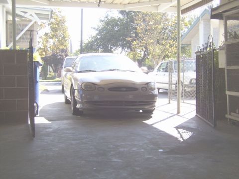 1998 Mercury Sable - Front view of a 1998 Mercury Sable parked in a driveway.