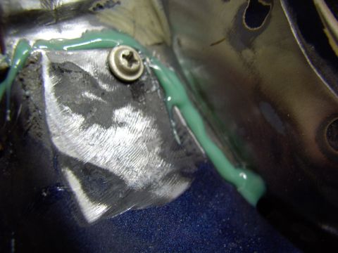 1986 Ford Bronco - Tossed a screw into the tab that goes up the A-pillar. Much more seam filler will be needed before final paint.