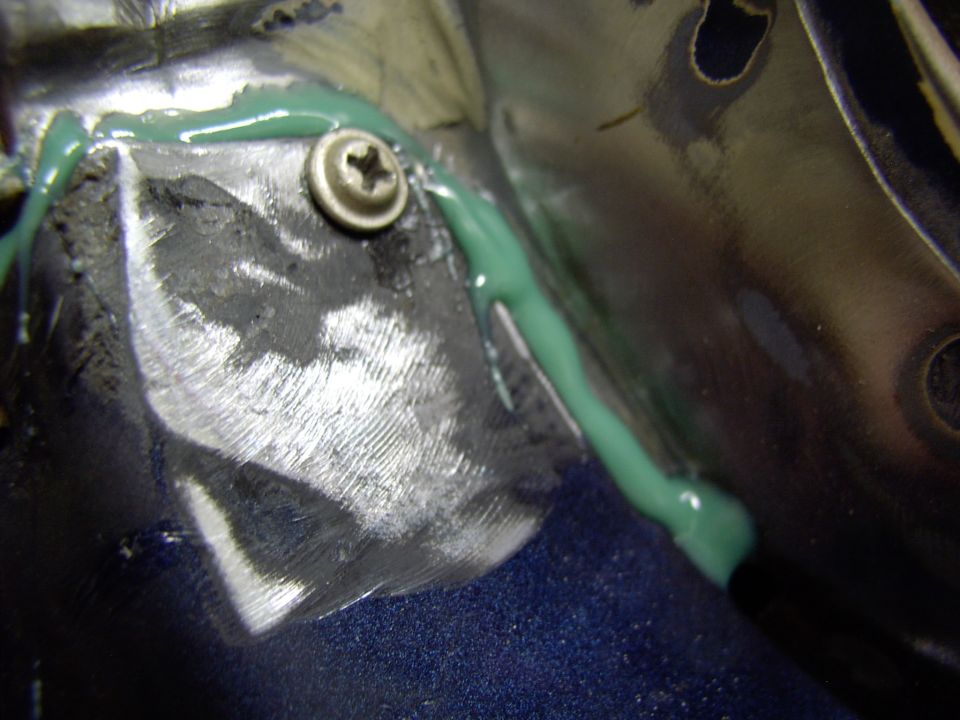 Tossed a screw into the tab that goes up the A-pillar. Much more seam filler will be needed before final paint.