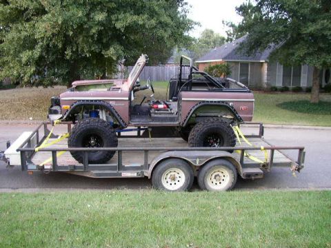 1995 Ford Bronco - This 1978 Ford Bronco is on a trailer, viewed from the front-left.