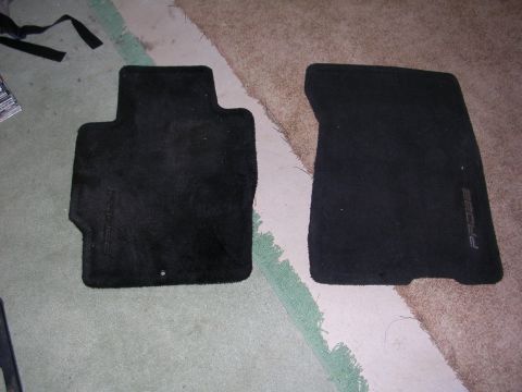 2003 Chevrolet Monte Carlo - Pair of black floor mats, one displaying the word 'PROBE'.