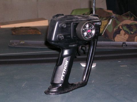 2003 Chevrolet Monte Carlo - A close-up view of a Python brand remote control transmitter, likely for an RC car or boat.