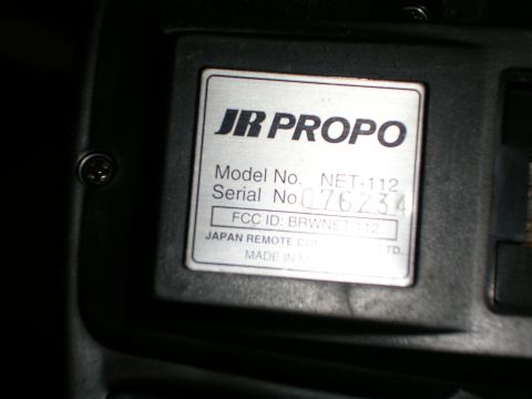 2003 Chevrolet Monte Carlo - A label on a device displays its model and serial numbers, along with FCC information and manufacturing details.