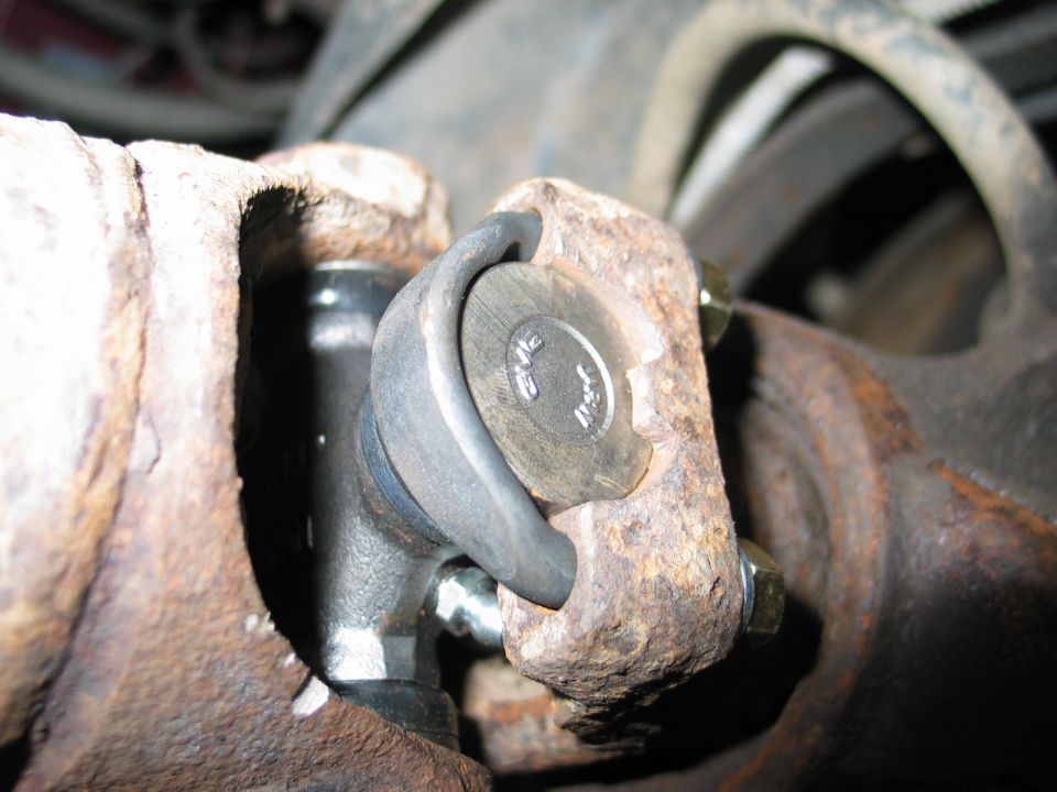 In some instances, it may be necessary to cut the u-bolts with a grinder. It is best to cut them so that the "u" part of the bolts falls off. This allows you to pull the rest of the bolts out with vice-grips.