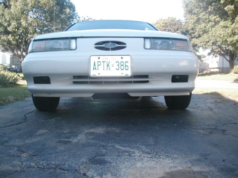 1993 Ford Taurus - Front view of a 1992 Ford Taurus, showing the grille and headlights.