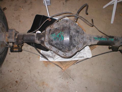 1978 Ford Bronco - Rear axle assembly with handwritten markings, possibly part numbers or identification codes.