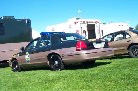 1991 Ford LTD Crown Victoria - Rear view of a 1991 Ford Crown Victoria LTD police car with 'HIGHWAY PATROL' on the trunk.