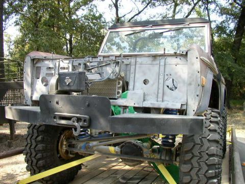 1995 Ford Bronco - This Ford Bronco appears to be undergoing restoration or modification, with its front end disassembled.