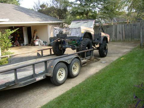1995 Ford Bronco - This 1995 Ford Bronco is loaded onto a trailer for transport, a modified suspension.