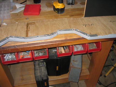 1995 Ford Bronco - Attaching the aluminum trim, which also holds the vynal tight and creates a cleaner looking seam.